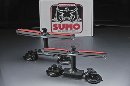 SUMO suction fishing rod holder by Rodmounts mounted on a truck roof rack for secure rod transport
